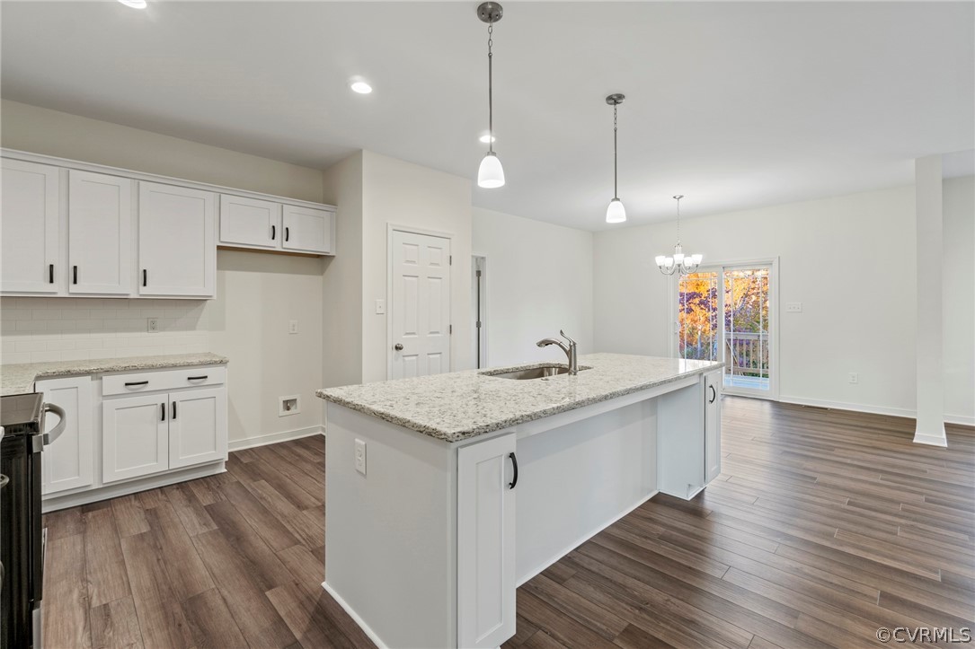 211 Edwin Circle Aylett, VA 23009 - Photo 15 of 48 a kitchen with a sink window and cabinets