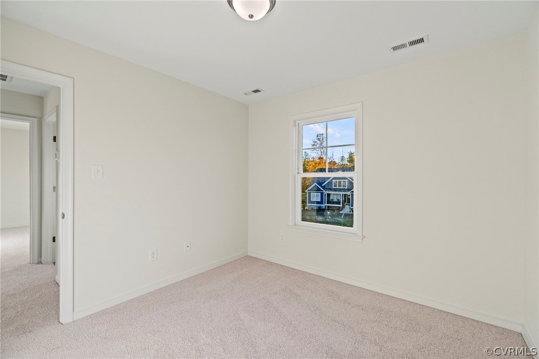 211 Edwin Circle Aylett, VA 23009 - Photo 19 of 48 an empty room with windows
