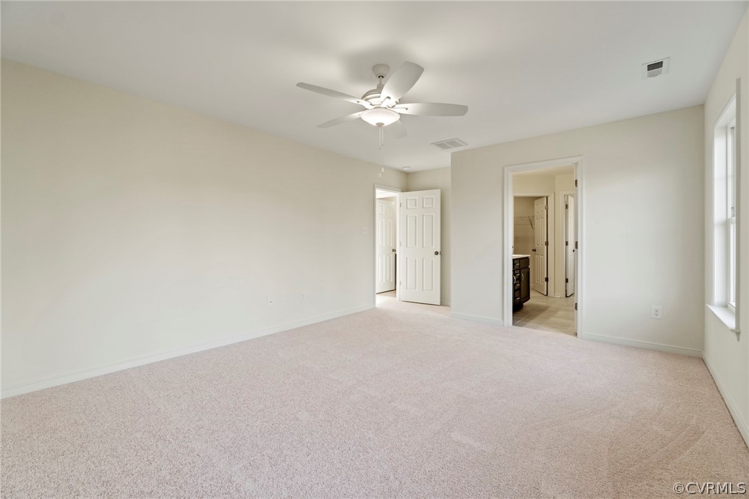 211 Edwin Circle Aylett, VA 23009 - Photo 23 of 48 a view of a livingroom with a ceiling fan and window
