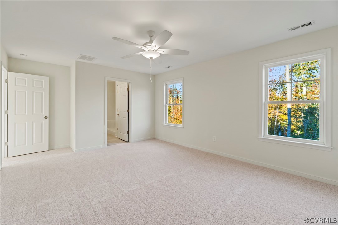 211 Edwin Circle Aylett, VA 23009 - Photo 24 of 48 an empty room with windows and closet