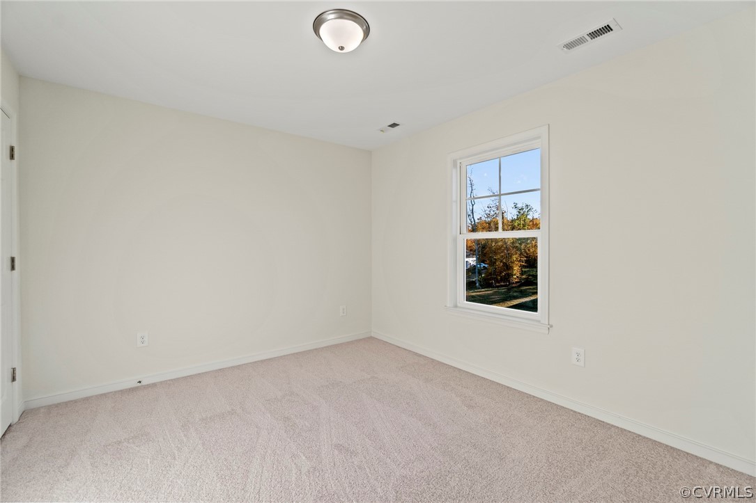 211 Edwin Circle Aylett, VA 23009 - Photo 26 of 48 an empty room with windows