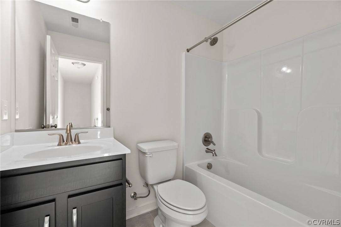 211 Edwin Circle Aylett, VA 23009 - Photo 29 of 48 a bathroom with a sink a toilet and shower