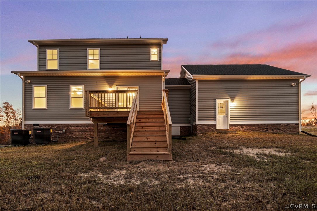 211 Edwin Circle Aylett, VA 23009 - Photo 3 of 48 a front view of a house with a yard