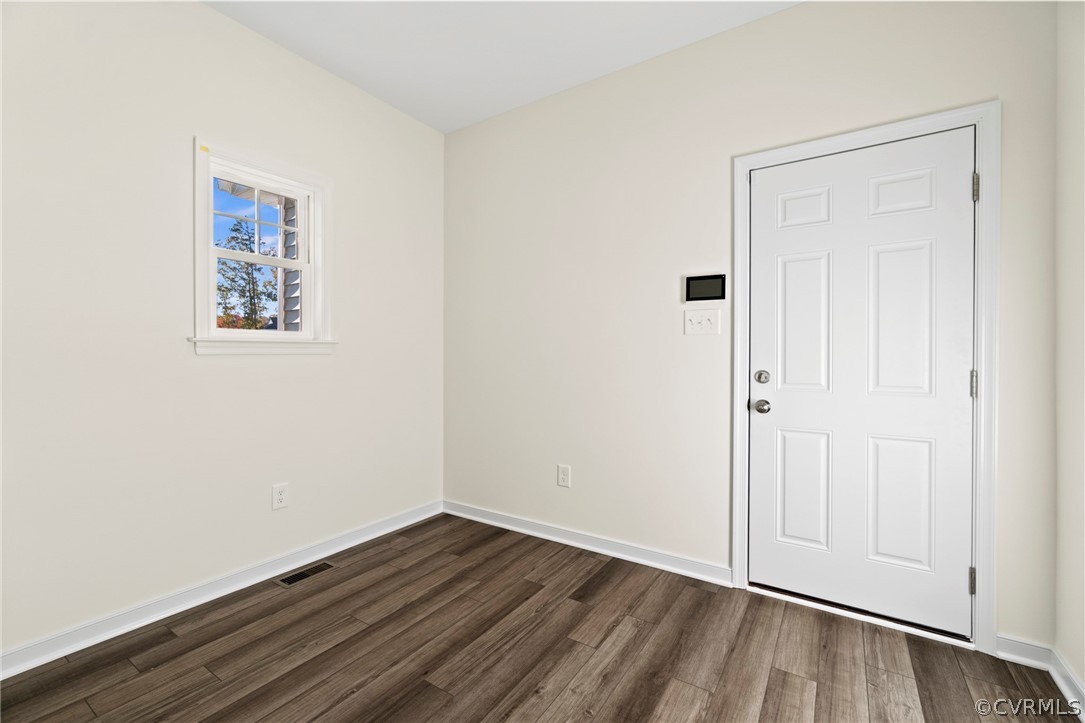 211 Edwin Circle Aylett, VA 23009 - Photo 31 of 48 an empty room with wooden floor and closet