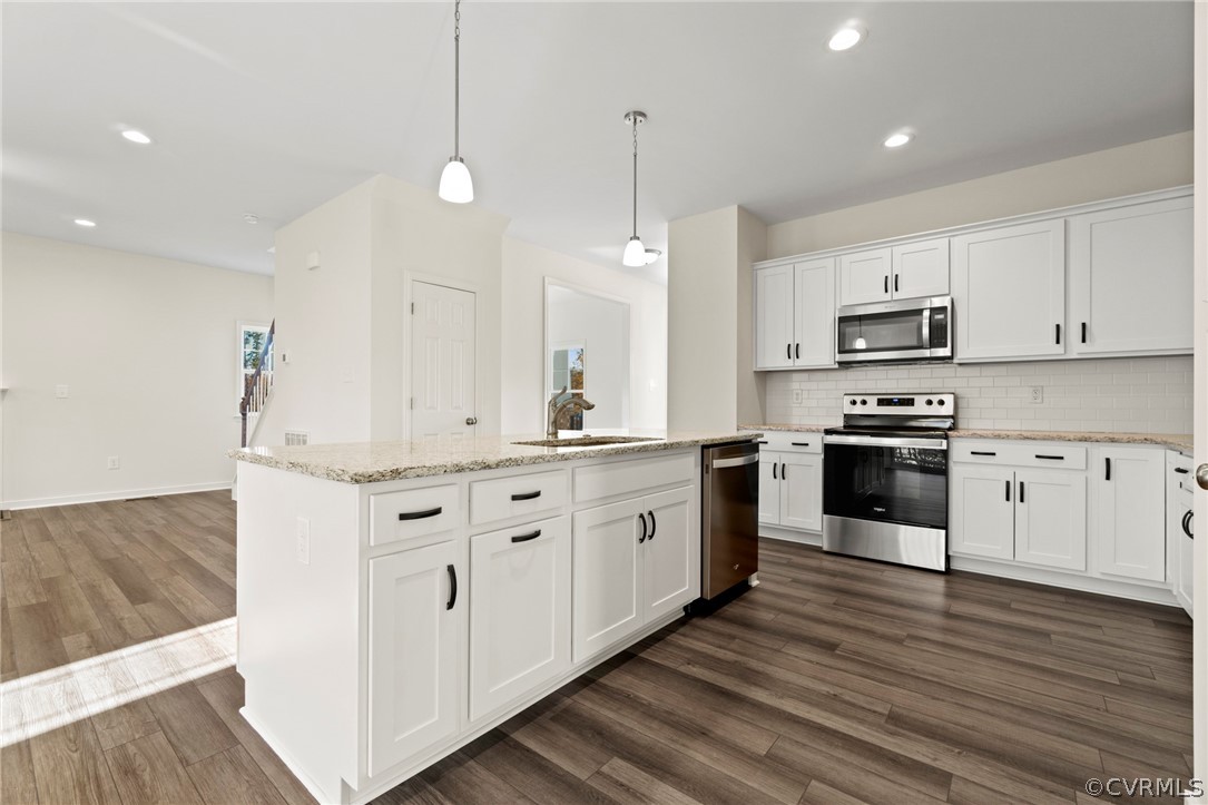 211 Edwin Circle Aylett, VA 23009 - Photo 36 of 48 a kitchen with granite countertop white cabinets and white appliances