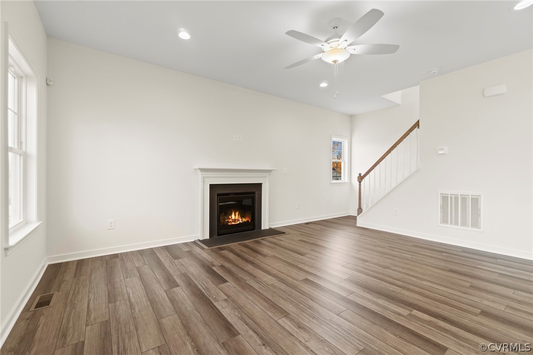 211 Edwin Circle Aylett, VA 23009 - Photo 38 of 48 wooden floor in an empty room with a fireplace