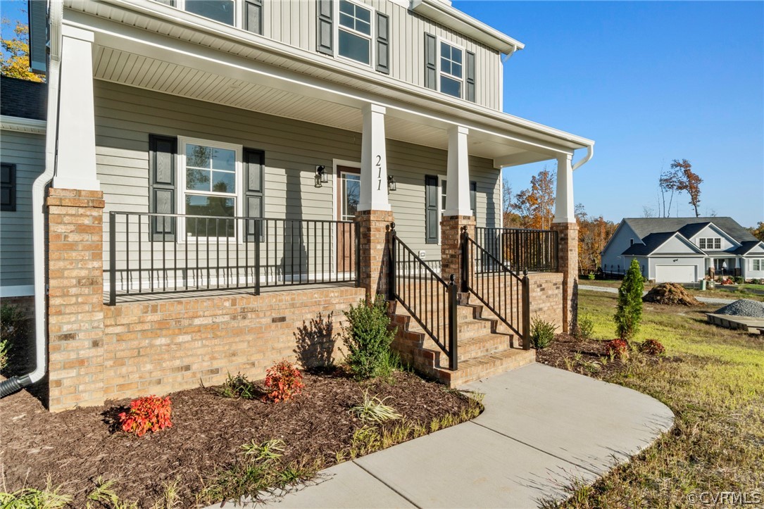 211 Edwin Circle Aylett, VA 23009 - Photo 44 of 48 a view of a house with backyard