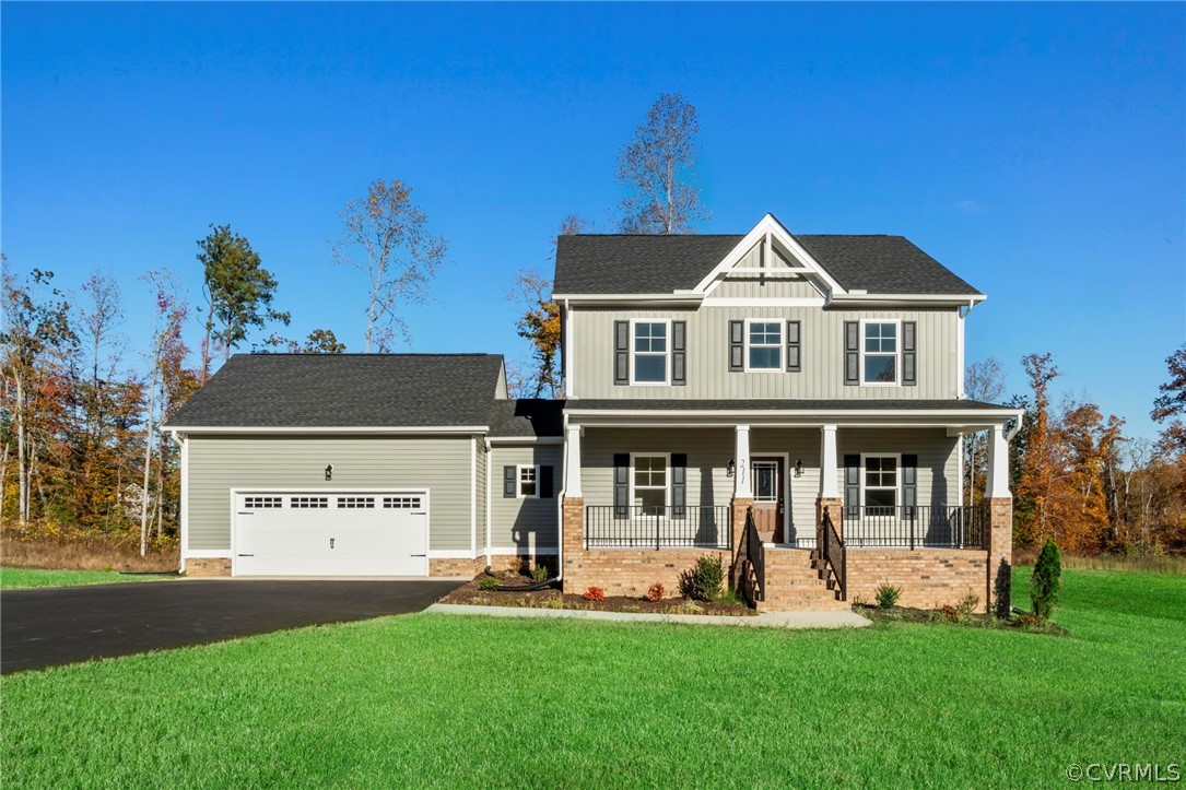 211 Edwin Circle Aylett, VA 23009 - Photo 47 of 48 front view of a house with a yard