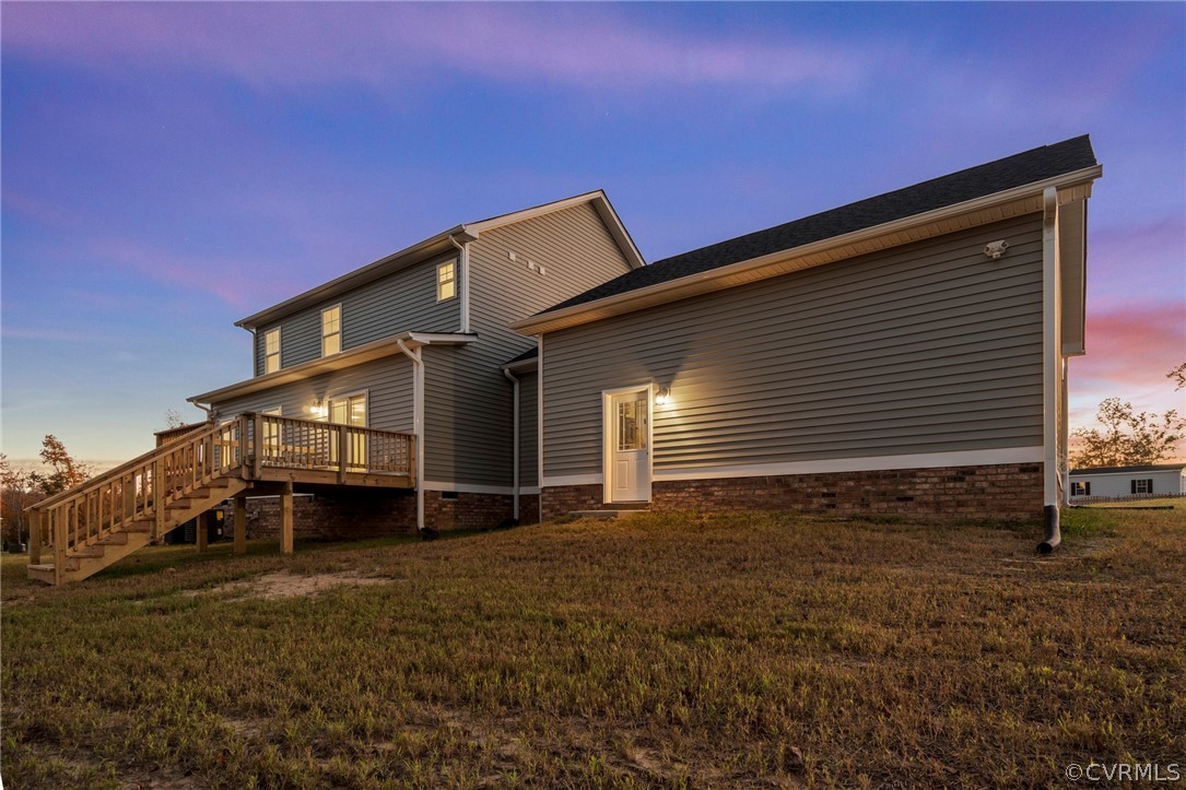 211 Edwin Circle Aylett, VA 23009 - Photo 5 of 48 a front view of a house with a yard
