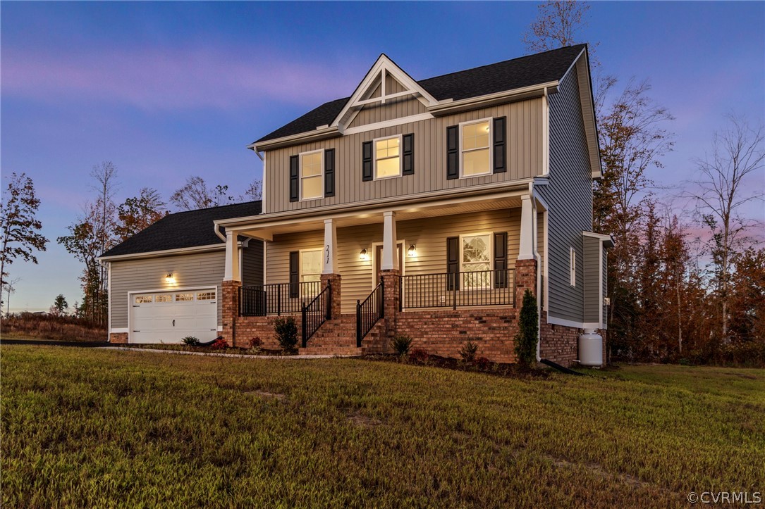 211 Edwin Circle Aylett, VA 23009 - Photo 8 of 48 front view of a house with a yard