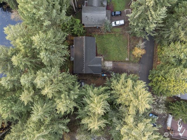 a backyard of a house with lots of green space
