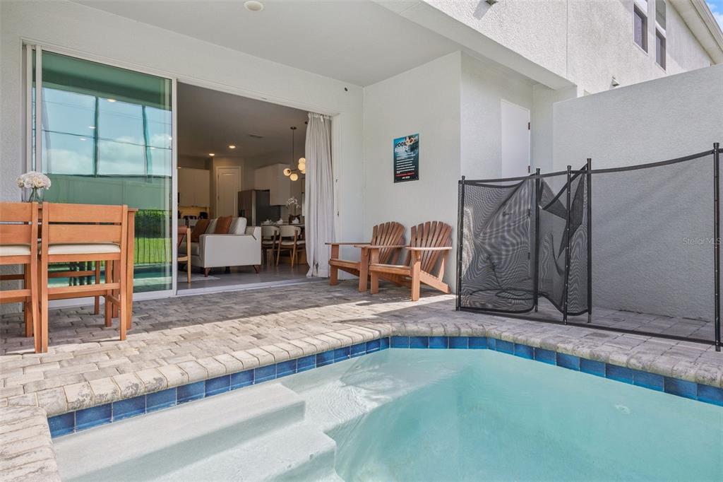 8008 Formosa Valley Place Kissimmee, FL 34747 - Photo 34 of 55 a view of a livingroom with furniture and a kitchen