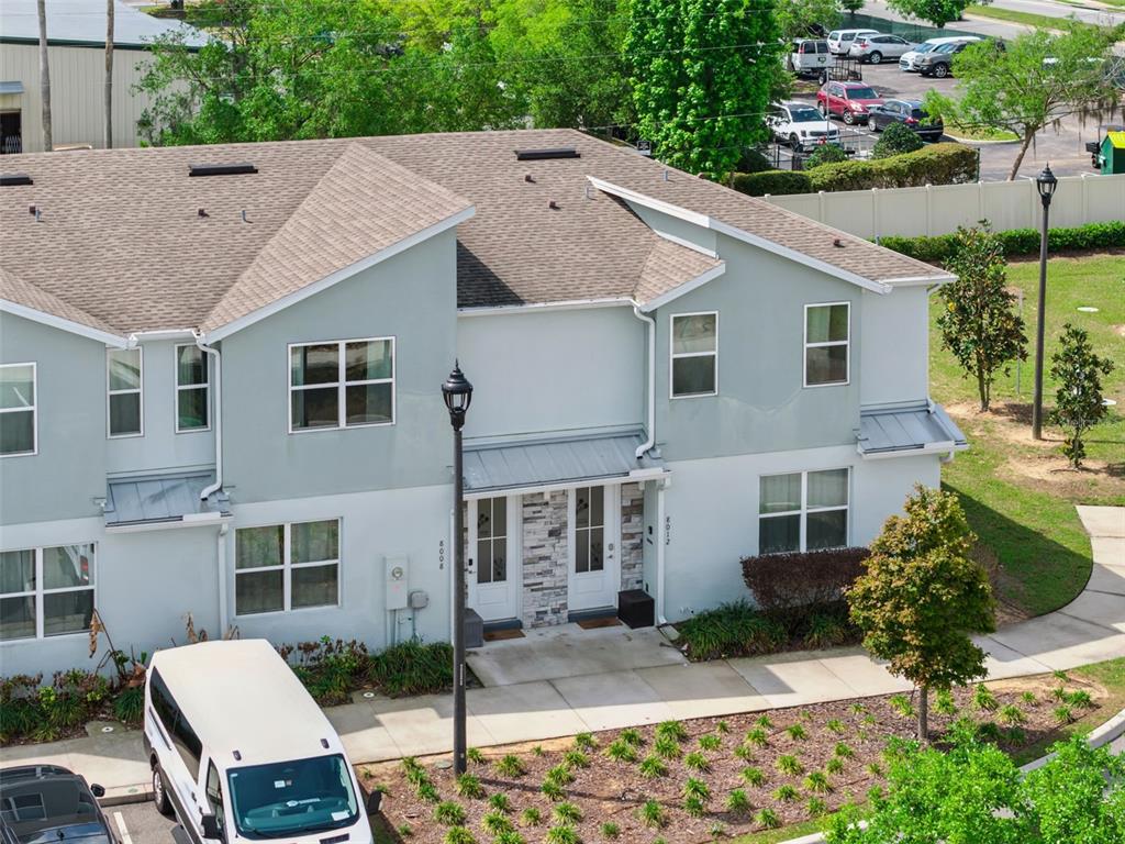 8008 Formosa Valley Place Kissimmee, FL 34747 - Photo 36 of 55 a aerial view of a house with a yard