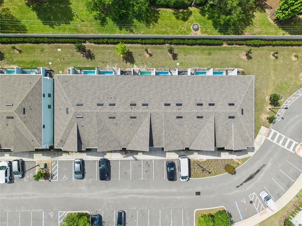 8008 Formosa Valley Place Kissimmee, FL 34747 - Photo 39 of 55 an aerial view of residential house with outdoor space and seating area