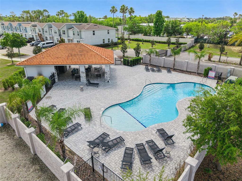 8008 Formosa Valley Place Kissimmee, FL 34747 - Photo 46 of 55 an aerial view of a house with garden space and street view