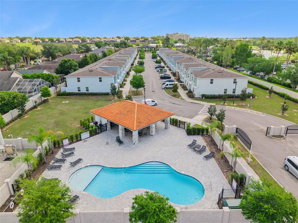 8008 Formosa Valley Place Kissimmee, FL 34747 - Photo 48 of 55 an aerial view of a house with garden space and street view