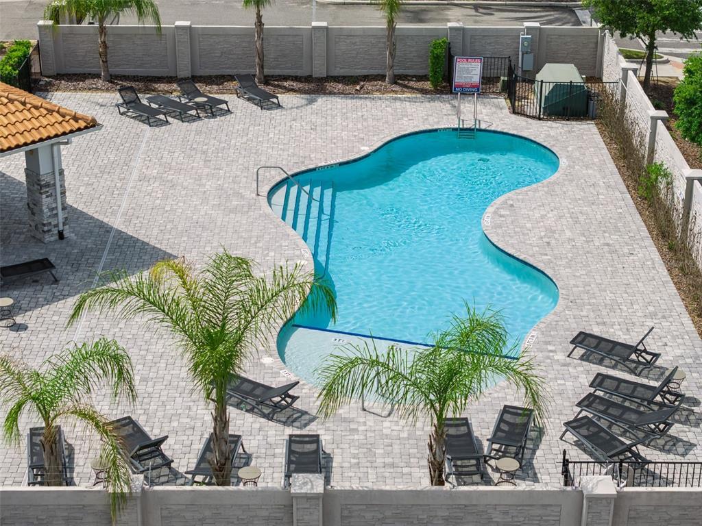 8008 Formosa Valley Place Kissimmee, FL 34747 - Photo 51 of 55 a view of a swimming pool with a patio