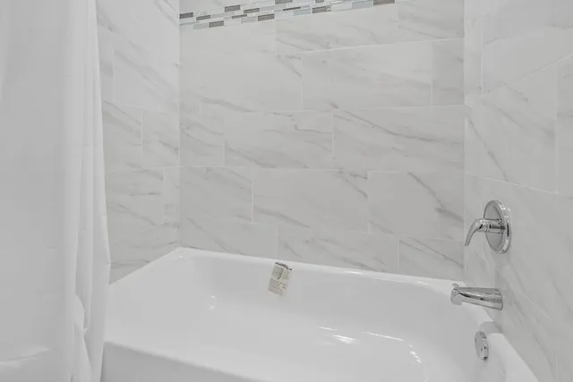 a close up of a bathtub