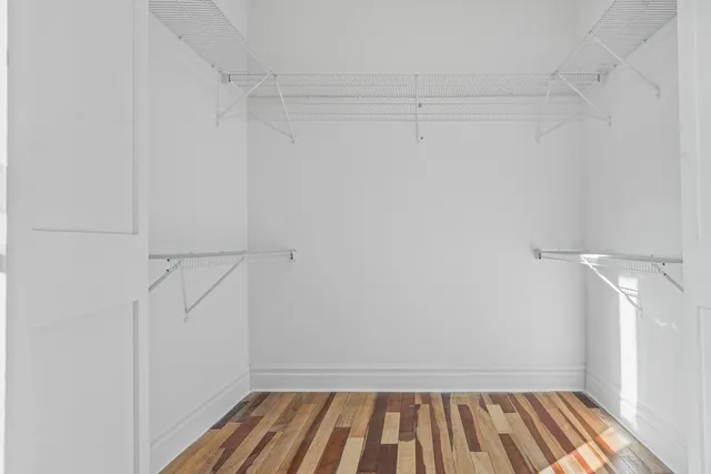 a view of a room with racks on the wall