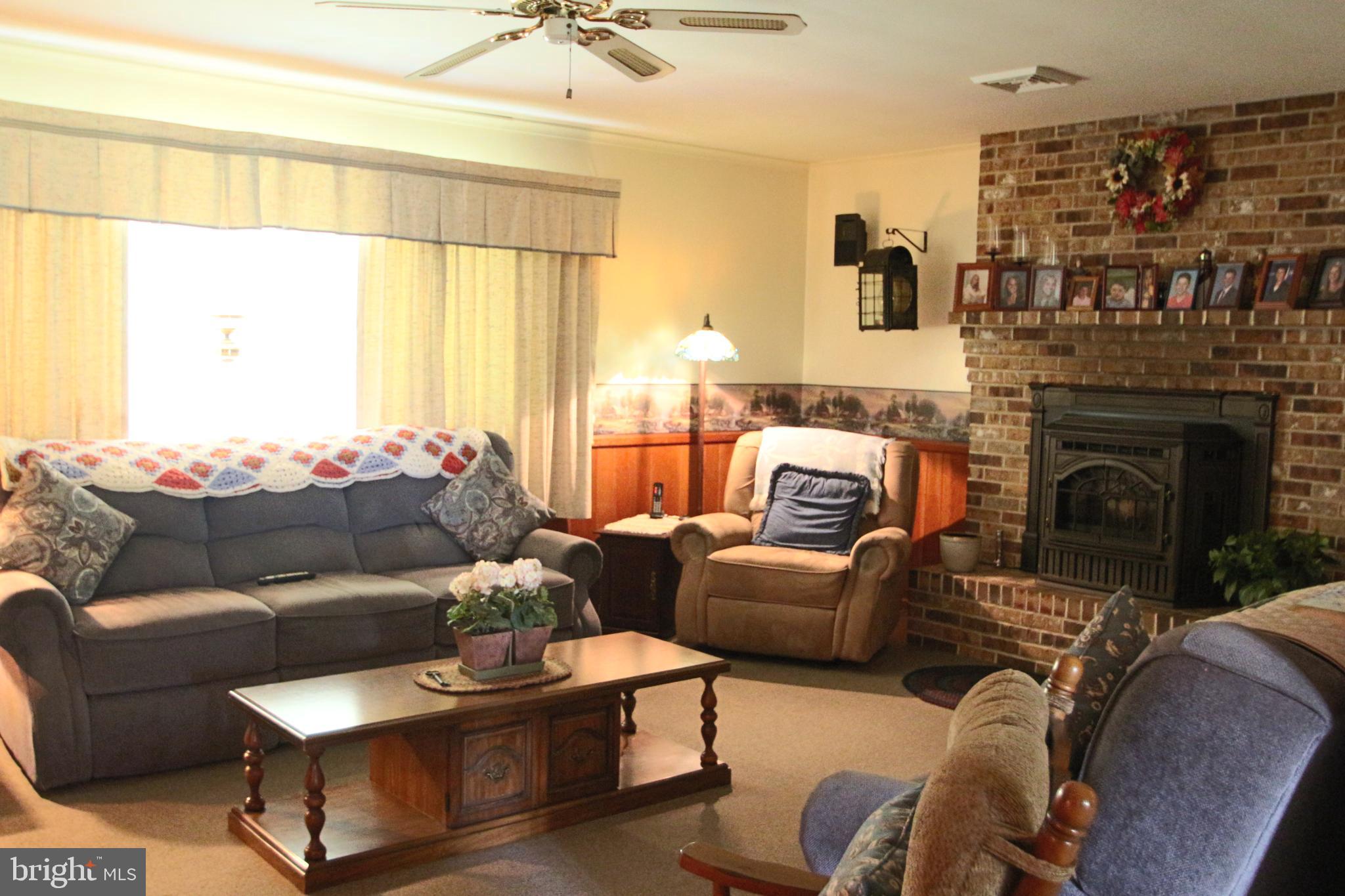 38 Riverview Road Pottstown, PA 19465 - Photo 38 of 66 Family room with fireplace and stove insert