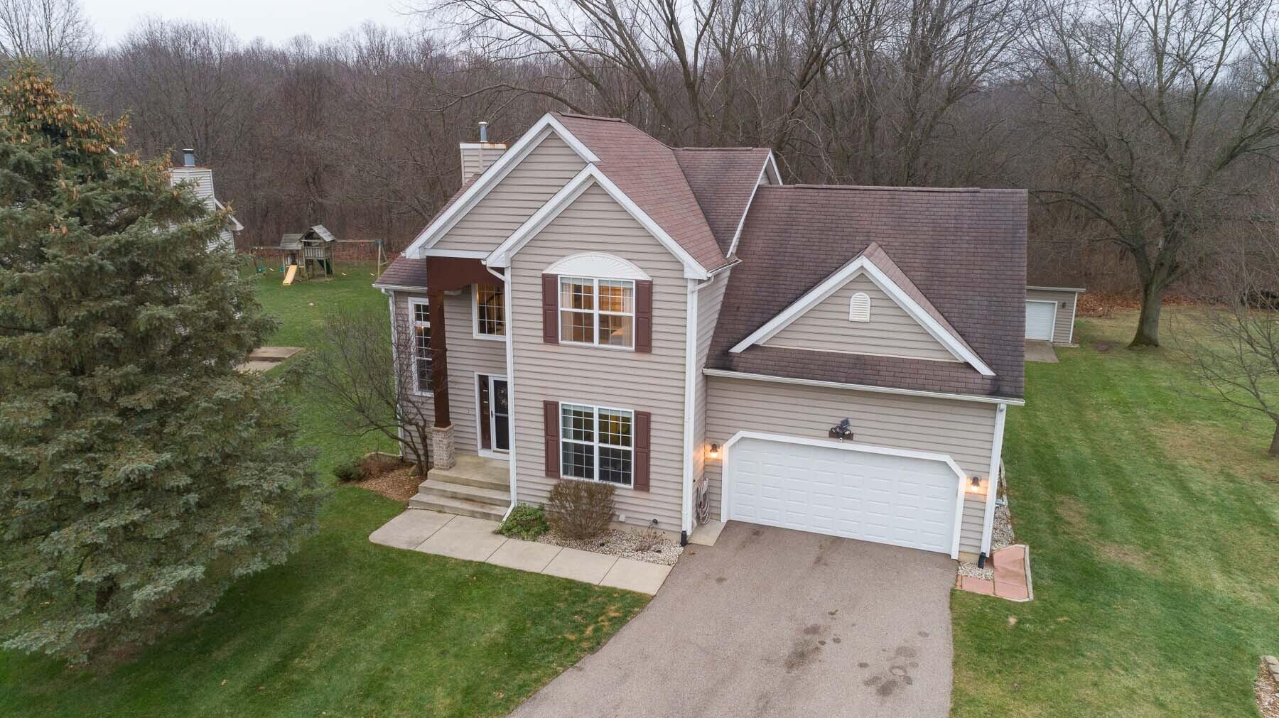 8679 Hathaway Road Kalamazoo, MI 49009 - Photo 1 of 49 Hath ext drone edited4- close up