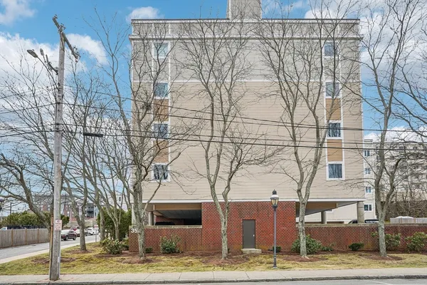 a view of a building with trees