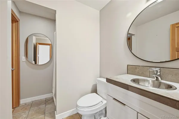 a bedroom with furniture and window