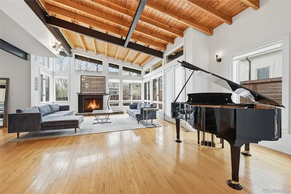 a large kitchen with stainless steel appliances granite countertop a stove a sink dishwasher and a refrigerator