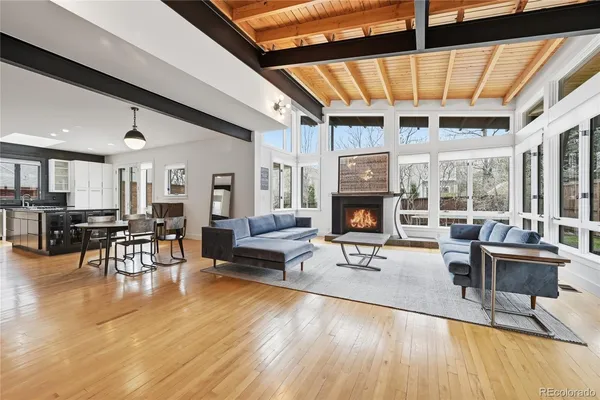 a large kitchen with stainless steel appliances granite countertop a lot of counter space and a sink