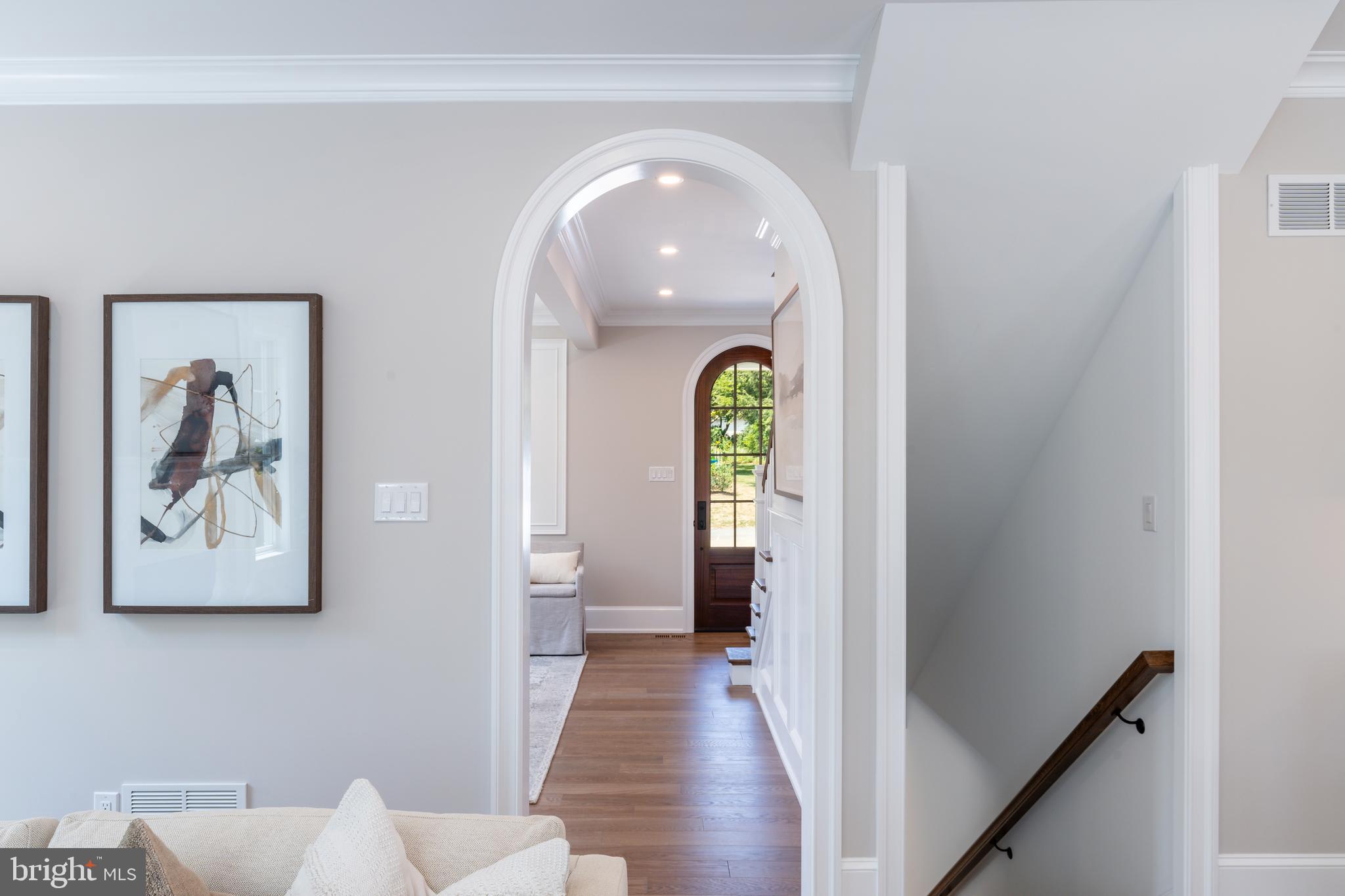 309 Overhill Road Wayne, PA 19087 - Photo 6 of 66 Arched entry from Living Room into Family Room