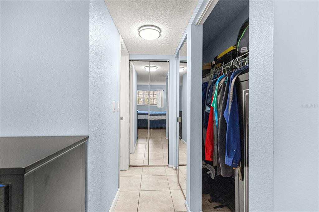 588 Fairways Lane, Unit E201 Ocala, FL 34472 - Photo 15 of 33 a view of walk in closet with clothes