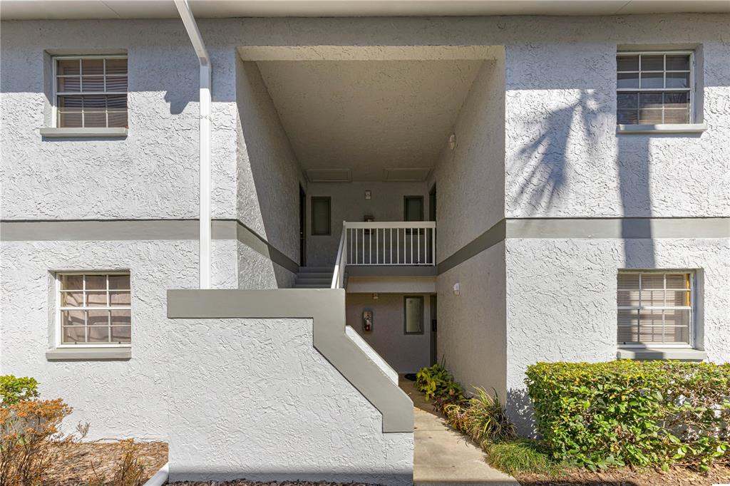 588 Fairways Lane, Unit E201 Ocala, FL 34472 - Photo 2 of 33 a view of entryway with a front door