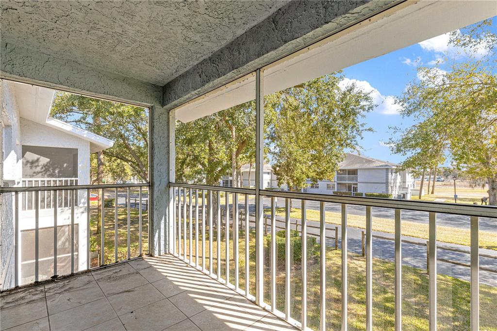 588 Fairways Lane, Unit E201 Ocala, FL 34472 - Photo 29 of 33 a view of a building from a balcony