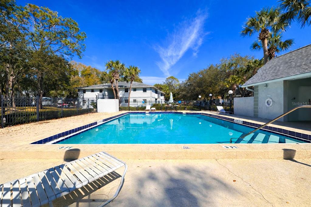 588 Fairways Lane, Unit E201 Ocala, FL 34472 - Photo 32 of 33 a view of an outdoor space and swimming pool