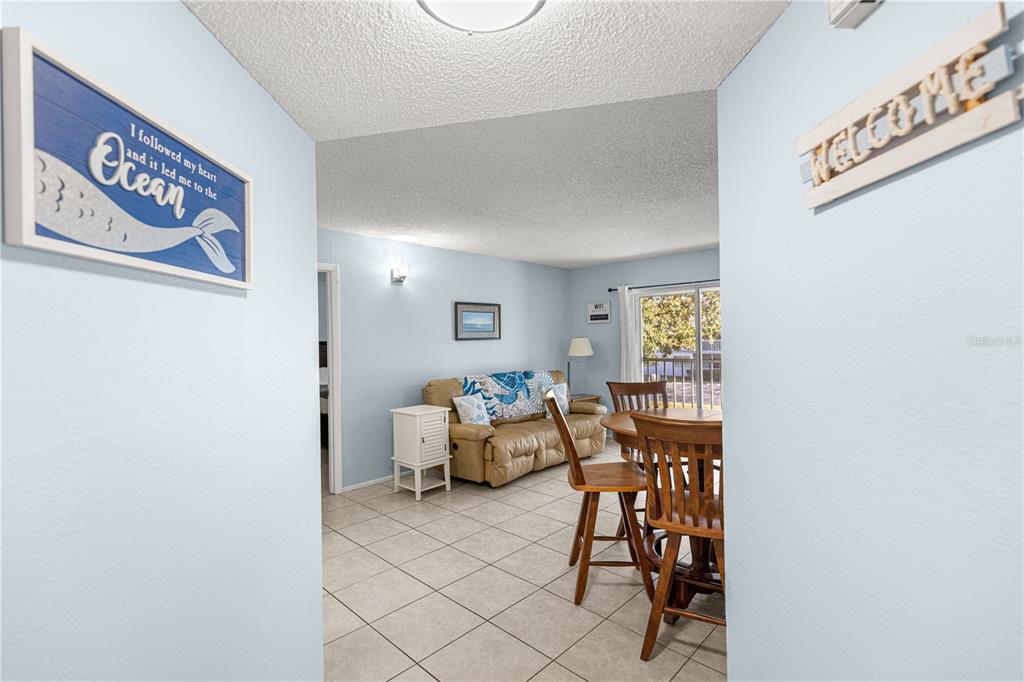 588 Fairways Lane, Unit E201 Ocala, FL 34472 - Photo 6 of 33 a living room with furniture and a table