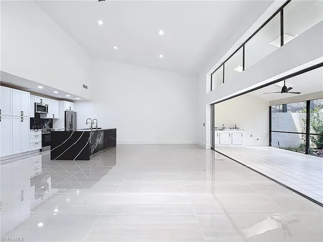 a large bedroom with bed