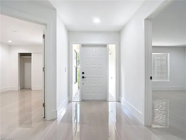 wooden floor in a hall with an entryway