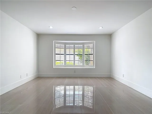 an empty room with a window
