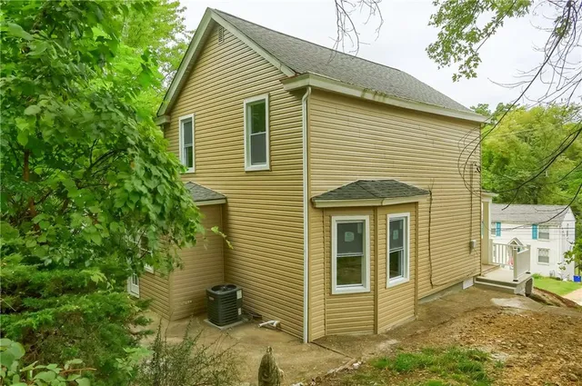a front view of a house with a porch