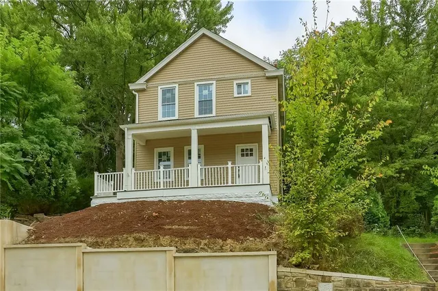 a house view with a garden space