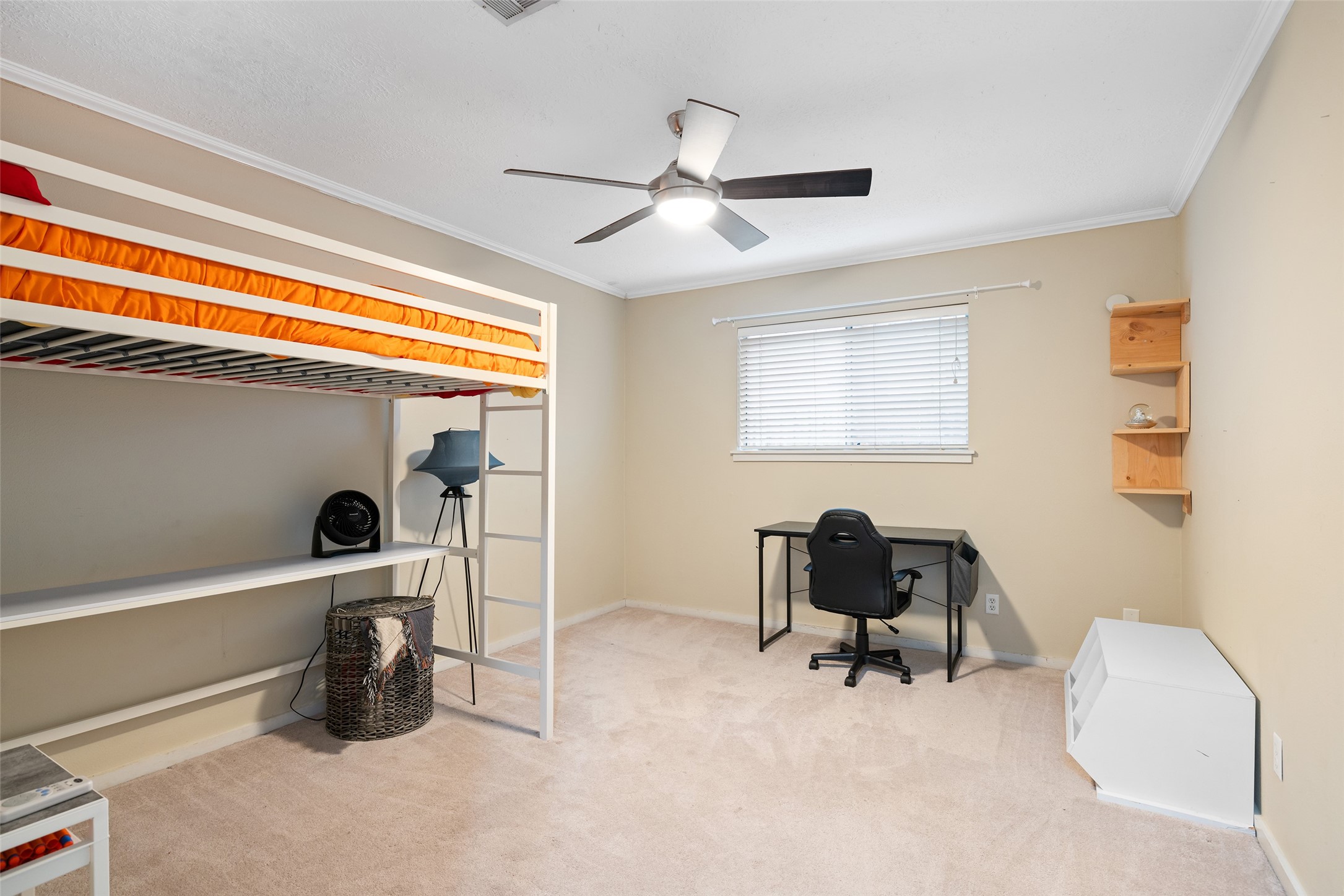 6702 Seinfeld Court Houston, TX 77069 - Photo 25 of 38 a work room with furniture and gym equipment