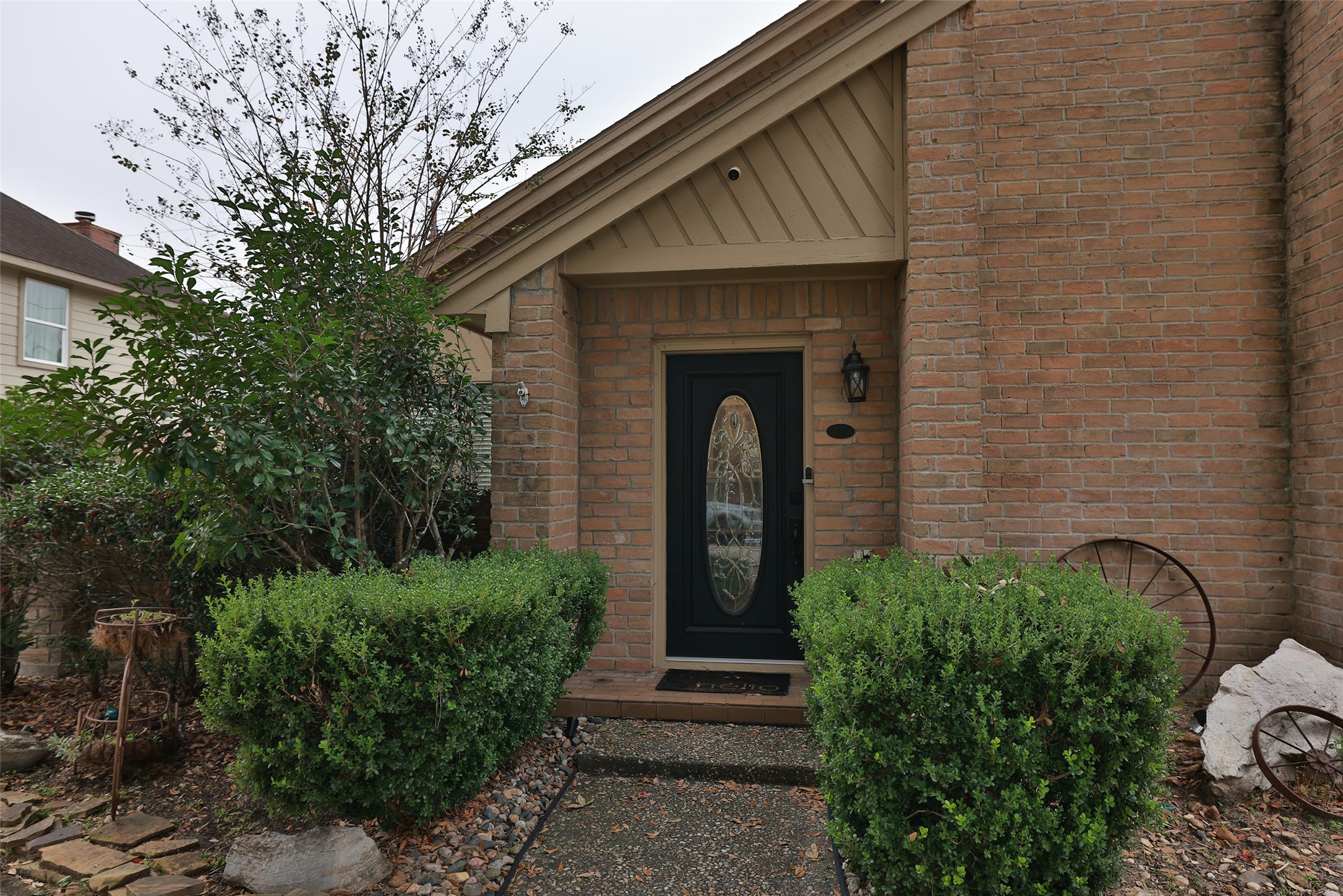 6702 Seinfeld Court Houston, TX 77069 - Photo 35 of 38 a front view of a house with plants