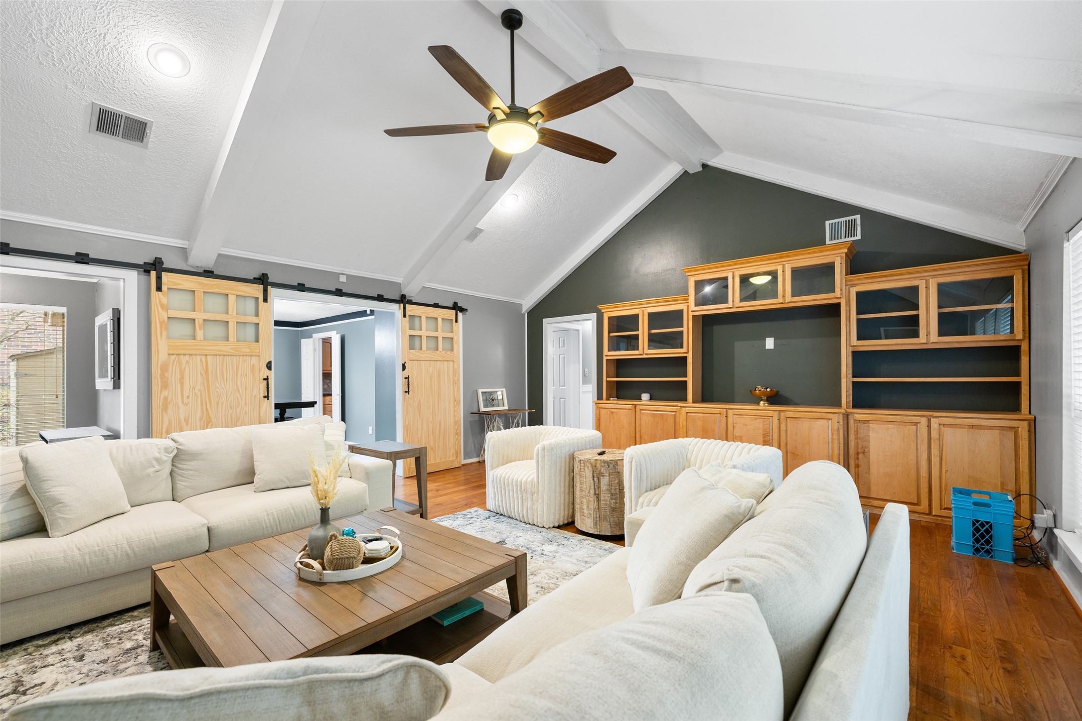 6702 Seinfeld Court Houston, TX 77069 - Photo 6 of 38 a living room with furniture ceiling fan and a window