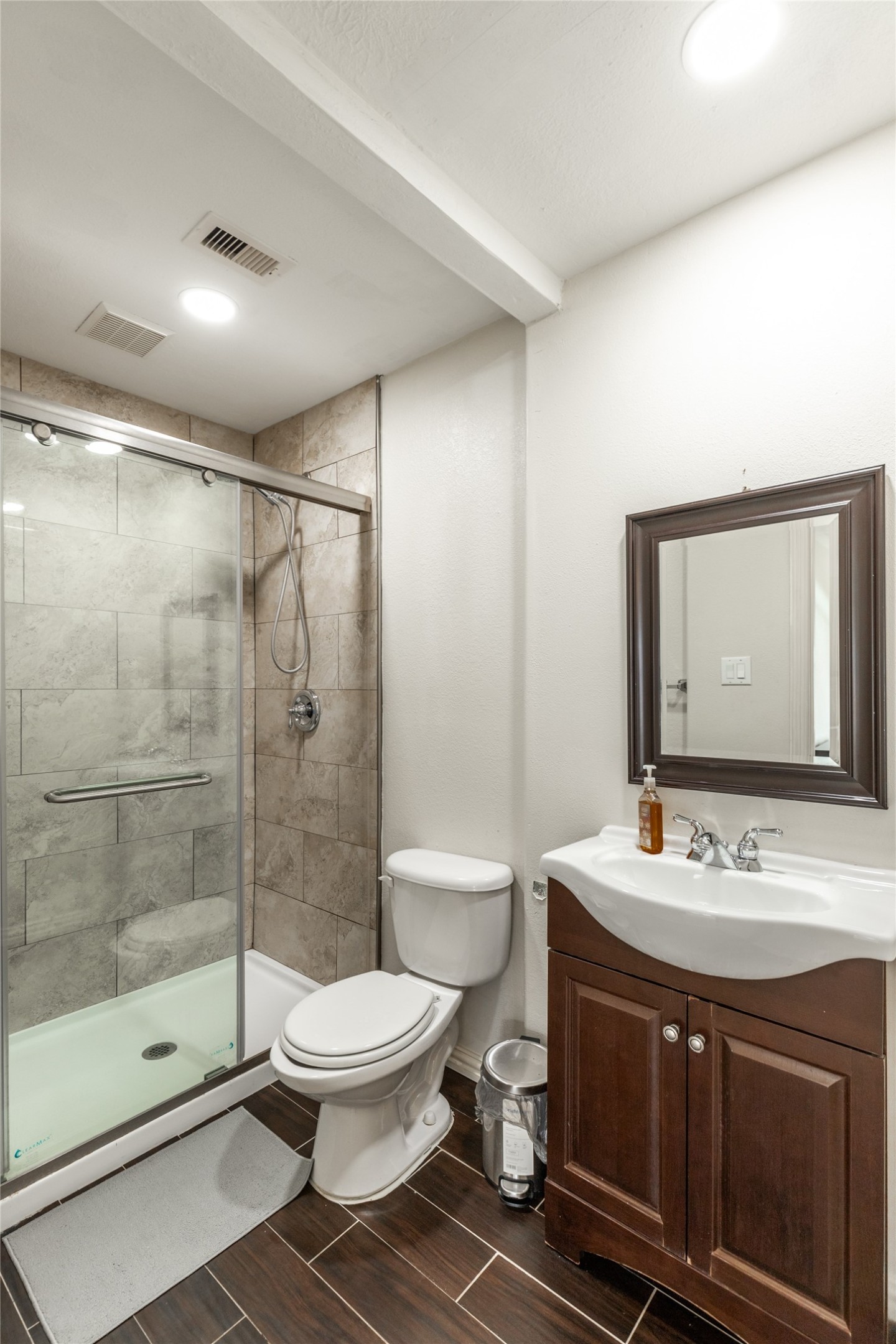 2923 Royal Oaks Crest Houston, TX 77082 - Photo 30 of 31 a bathroom with a sink toilet and shower
