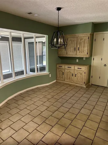 a view of a entryway door front of a house