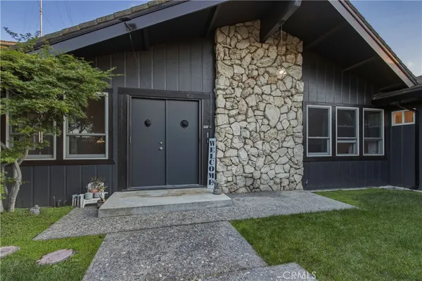 a front view of a house having yard