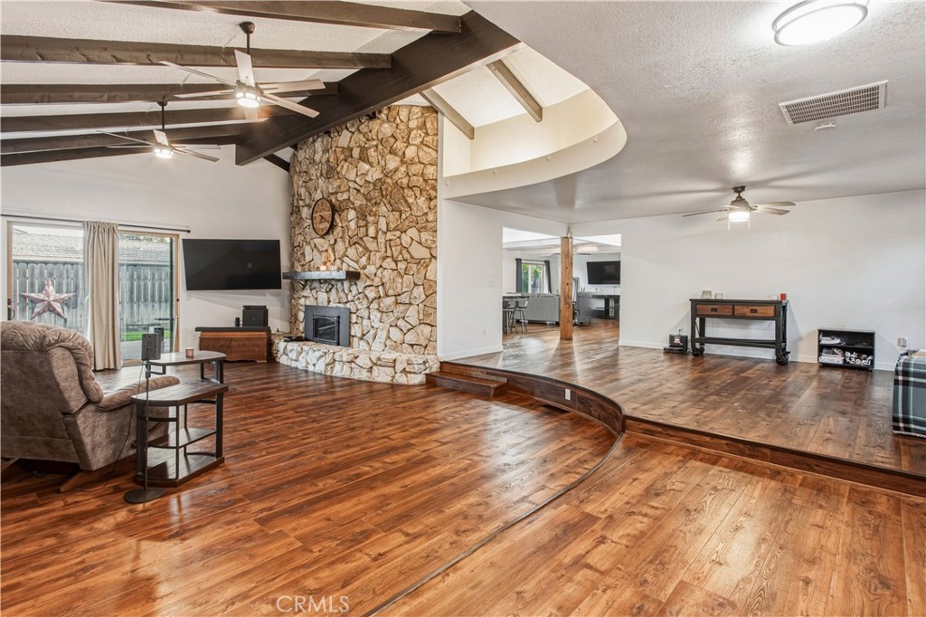 1908 Chelwood Way Modesto, CA 95355 - Photo 13 of 44 a view of a livingroom with furniture and a flat screen tv