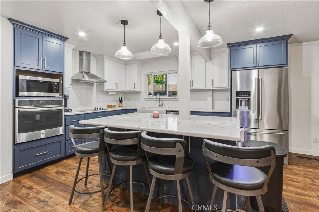 1908 Chelwood Way Modesto, CA 95355 - Photo 15 of 44 a kitchen with granite countertop a counter space stainless steel appliances and cabinets
