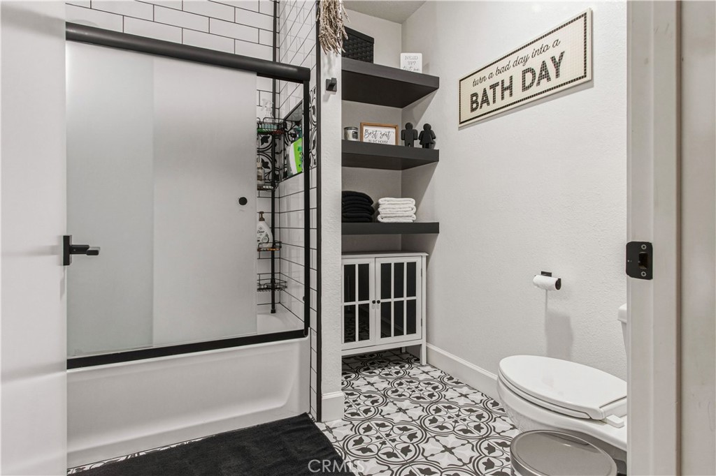 1908 Chelwood Way Modesto, CA 95355 - Photo 22 of 44 a bathroom with a toilet and a shower