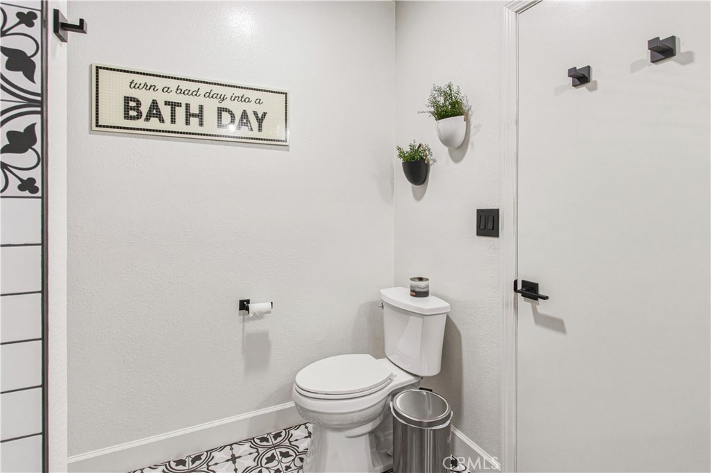 1908 Chelwood Way Modesto, CA 95355 - Photo 23 of 44 a white toilet sitting next to a shower